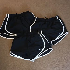 Black Nike running shorts